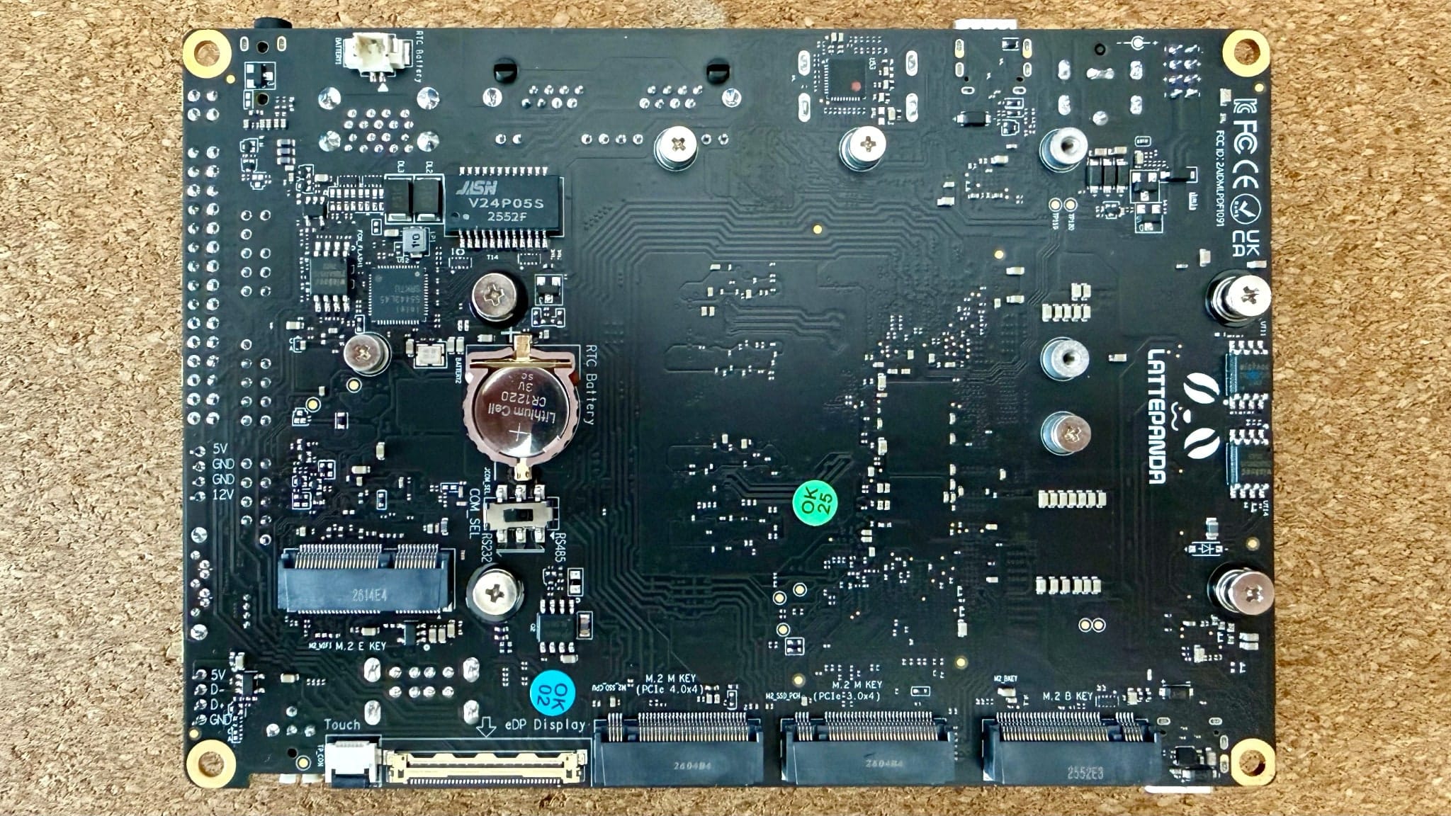 Underside of the Sigma board with M.2 slots, RTC battery and expansion headers
